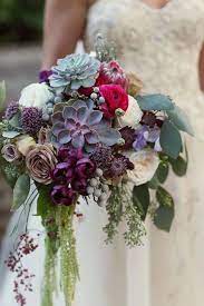 Browse offbeat bouquet options in various colors and blooms. Tulip Echeveria Succulent And Mink Protea Bouquet The Oh So Trendy Succulent Makes A Striki Unique Wedding Bouquet Wedding Flowers Succulent Bouquet Wedding