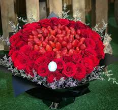 Yummy strawberry and passion fruit meringue cake on wooden board delicious pancakes with strawberries and flowers in vase on table. Red Flower Arrangement With Strawberries Red Flower Arrangements Beautiful Bouquet Of Flowers Flower Arrangements