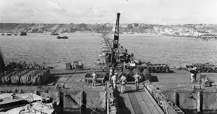Mulberry Harbour A Off D Day Omaha Beach In Background At Saint Laurent Sur Mer Normandie