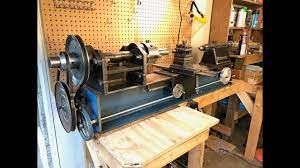 Making A Homemade Scroll Saw By Using Old Wooden Chair Parts And Plywood Powered By A Drill Cok Uygun Bir Maaliyetle Kendi Lathe Homemade Lathe Diy Lathe
