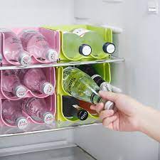 A wine cooler, also known as a wine refrigerator is a small appliance that stores wine at a regulated temperature to ensure optimal aging and freshness. 2 Layer Refrigerator Organizer Beer Wine Bottle Storage Rack Cupboard Champagne Wine Holder Space Saving Kitchen Organizer Racks Holders Aliexpress