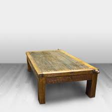 Parsons style coffee table in reclaimed old rustic coffee table with slatted shelf design. Old Door Coffee Table Cowhide Western Furniture
