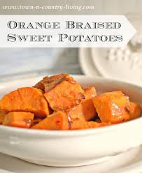 Orange Braised Sweet Potatoes Town Country Living Orange Sweet Potato Recipe Sweet Potato Recipes Potato Side Dishes
