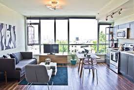 Orange wall in modern studio space. Living Big In A Tiny Studio Apartment Inspiring Interior Design Ideas