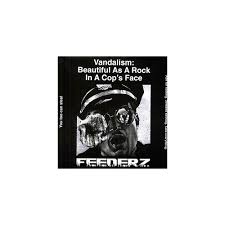 Vandalism Is Beautiful As A Rock In A Cop S Face Alliance Feederz Vandalism Beautiful As A Rock In A Cops Face Rock Face Cops