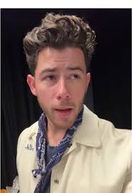 Nick Jonas Red Dress