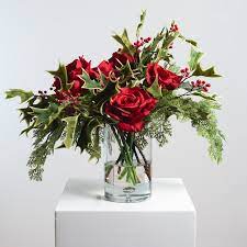 Tis The Season Red Christmas Rose Cypress Holly Holiday Floral Arrangement Centerpiece In Glass Vase In 2021 Holiday Floral Arrangements Christmas Arrangements Centerpieces Christmas Flower Arrangements