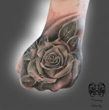 Black And Grey Hand Tattoos For Men Rose Hand Tattoo Black Grey Google Search Rose Hand Tattoo Hand And Finger Tattoos Hand Tattoos For Guys