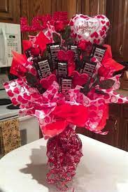 Beautiful red roses bunch and heart shaped floral arrangements are the best suited gifts for this day. Bouquet Valentines Candy Bouquet Valentine Gift Baskets Valentine S Day Gift Baskets
