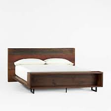 Six large drawers positioned below the bed ; Atwood King Bed With Bookcase Reviews Crate And Barrel