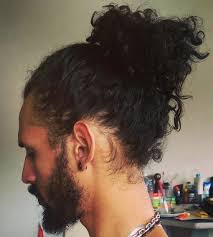 More and more people with any hair length are trying them on and absolutely love the results they get. Man Bun Hairstyle Guide For Curly Hair Men Man Bun Hairstyle