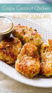 The video says cumin instead of curry. Crispy Coconut Chicken With Spicy Honey Orange Sauce Sally S Baking Addiction