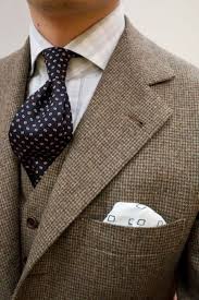Black And White Houndstooth Suit Beige Green And Brown Houndstooth Patterned Three Piece Suit Dark Blue Tie With Red Squares White Light Grey Check Mens Outfits Well Dressed Men Tweed Suits