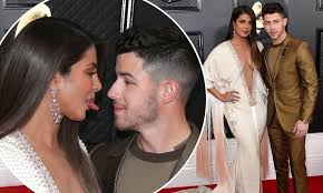 Priyanka Chopra wows at the Grammy Awards in plunging gown as she shares a  smile with Nick Jonas | Daily Mail Online