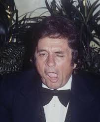 Hello, I found while yard sale-ing here in Ocala/Silver Springs this black  and white original Kodak photograph of a cowboy leaning