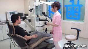 Tiny JAV hottie gets fucked in the doctors office - XNXX.COM