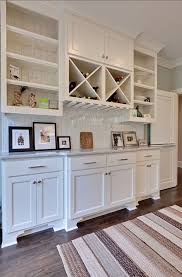 Rustic kitchen cabinets heavily make use of natural materials such as solid hardwoods with prominent graining patterns, often in clear wood stain finish. White Kitchen Dining Room Built In Dining Room Buffet Dining Room Built In Cabinets