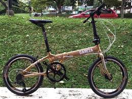 Suddenly 'too far' or 'too big' is not the issue, and the question becomes 'where to next?' Folding Bike Gold Garcia Tiger 2015 Folding Bikes Singapore Marketplace Bike Folding Bike Cool Bikes