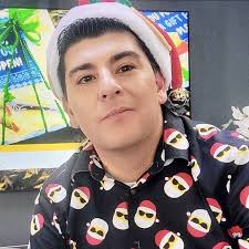 Phillip Tapia of Colorado, the Ugly Sweater Elf, hides cash in Detroit