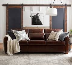 Pottery barn leather sofa with wood base. 31 35 81 90 Leather Furniture Pottery Barn
