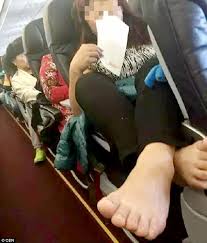 Catalina cathy aguas was robbed and shot in the head to death at copernicus st., brgy. Airasia Passenger Shares Pictures Of Woman Who Put Her Feet On Her Armrest During Flight Daily Mail Online