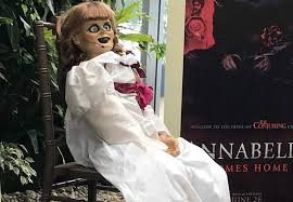 A vintage doll in a beautiful white dress. I D Be Concerned If Annabelle Really Did Leave Museum Owner Puts Haunted Doll Escape Rumors To Rest