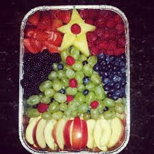 Fill in each section with kiwi slices. Christmas Tree Fruit Salad Apples Green Grapes Raspberries Blackberries Strawberries Best Fruit Salad Fruit Salad With Marshmallows Fruit Pizza Designs