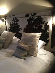 Gift your space a charming look with rousing cowhide bed at alibaba.com. Rustic Classy Cowhide Headboard Western Bedroom Decor Dream House Plans Western Bedroom