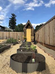 A lawn edger can be used to keep the sidewalk outside your home perfectly manicured so that your front lawn will be the object of garden envy from your neighbors. Corrugated Metal Landscape Edging Metal Landscape Edging Lawn Edging Garden Lawn Edging