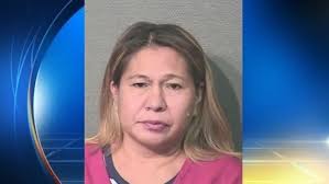 Woman accused of throwing cellphone at 12-year-old son