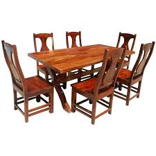 The double pedestal design is both bold and delicate, with its solid wood construction maintaining sturdy stability to support the expansive table top. 7 Piece Solid Wood Double Pedestal Dining Table And Chair Set