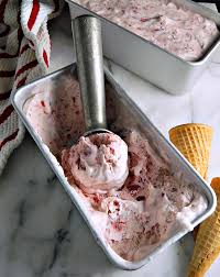 Ice cream served in mason jars, add a few toppings (caramel, fudge, crushed chocolate bars) on the side for a make your own ice cream dessert. No Churn Strawberry Ice Cream Frugal Hausfrau