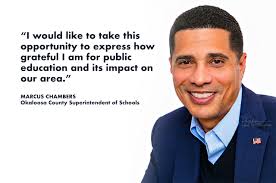 Superintendent Marcus Chambers gives thanks during Public Schools Week