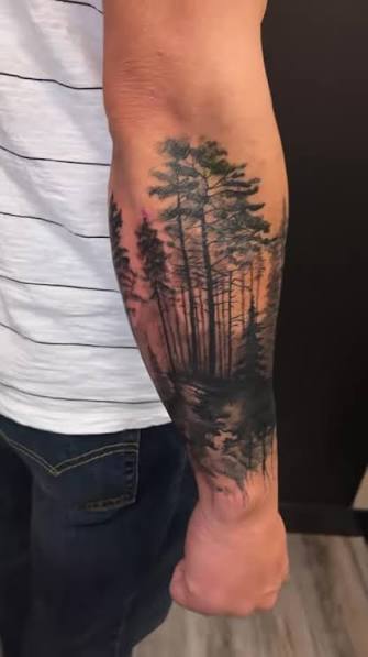 “Fresh forest landscape tattoo 🌲✨ Inspired by the beauty of Canadian nature, this black & grey piece captures the calm of the wilderness right here in Calgary., 👉 Follow for more tattoos, ❤️ Like if ...