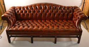 The rolled arms feature nail head details that. Leather Camel Back Sofa Ideas On Foter