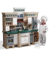 Play kitchen set buying guide. Lifestyle Deluxe Kitchen Your Little Chef Will Be Ready To Whip Up A Six Course Meal In Her Own Realist Play Kitchen Sets Kids Play Kitchen Kids Toy Kitchen