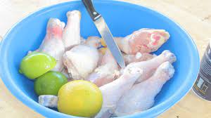 Once the inner cavity is clean, trim the excess fat and gristle around the neck and tail area with a sharp knife. How To Clean Drumsticks The Haitian Way Cleaning Seasoning Youtube