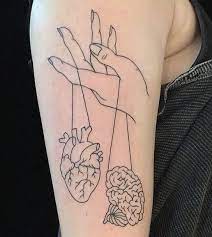 24 Minimalistic Tattoos That Are The Ideal Balance Of Bold And Elegant Tattoos Brain Tattoo Minimalist Tattoo