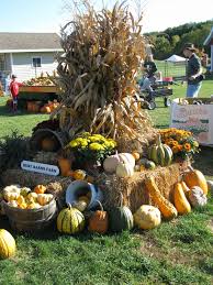 For A Large Display Like This One Tie 6 8 Corn Bundles Around A Stake Surround With Straw Bales Fall Outdoor Decor Fall Festival Decorations Fall Outdoor