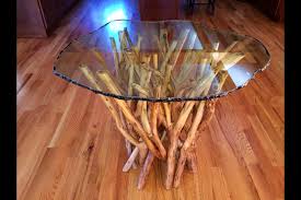 It's crafted from solid reclaimed teak wood, and strikes a circular silhouette in a light, natural. Youngmenheaven Dining Tree Trunk Table Base