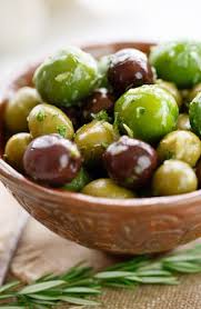 A Selection Of Plump And Juicy Olives Marinated And Infused With Extra Virgin Olive Oil White Wine Vinegar Lemon Rosemar Olive Recipes Marinated Olives Food