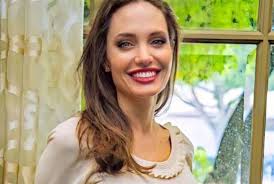 She then jumps into a. Angelina Jolie Praises Firefighters Dishes New Movie