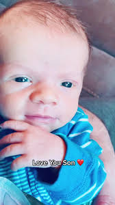 Baby Samuel and Dad Sharing a Heartfelt Moment