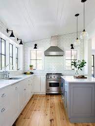 Whether you are looking for the kitchen, bath, closet or any other room in the house, we offer an wide array of design choices, which in turn allows you as the homeowner or builder flexibility in capturing that exact look you desire. The Clean Lined Farmhouse In Dutchess County Ny An American Classic Gets A Modern Makeover Farmhouse Kitchen Remodel Farmhouse Kitchen Flooring Kitchen Remodel