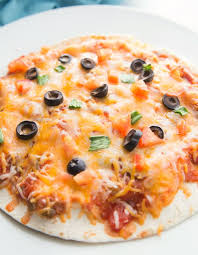Copycat Taco Bell Mexican Pizza Stacks Tortillas Topped With Melted Cheese Olives Tom Mexican Pizza Taco Bell Mexican Pizza Copycat Taco Bell Mexican Pizza