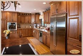 Cabinets Showplace Chesapeake Creates Timeless Warmth In Red Oak Cagnac Stained Kitchen Cabinets Kitchen And Bath Design Kitchen Cabinets In Bathroom