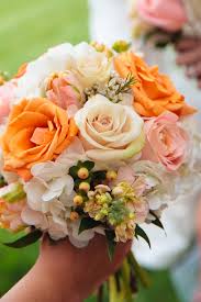 The elegant coral color wedding are on enticing offers to make you save money as you spice up your looks. Perfectly Peach At Terrace On Grand Orange Wedding Flowers Peach Wedding Flowers Wedding Table Flowers