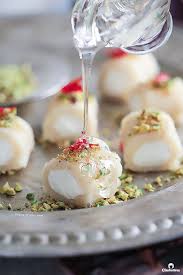 Halawet El Jibn Sweet Cheese Rolls Cleobuttera Recipe Arabic Dessert Desserts Middle Eastern Desserts