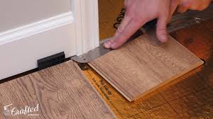 Measure the lip of the threshold's trim and leave enough clearance between the door and the flooring to install the threshold. Installing Laminate Flooring For The First Time Crafted Workshop