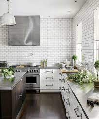 The long wall of the #kitchen design with no upper #. Kitchen Trend No Upper Cabinets Emily A Clark